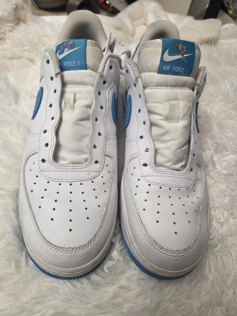 Nike White Sneakers with Blue Swoosh and Tongue
